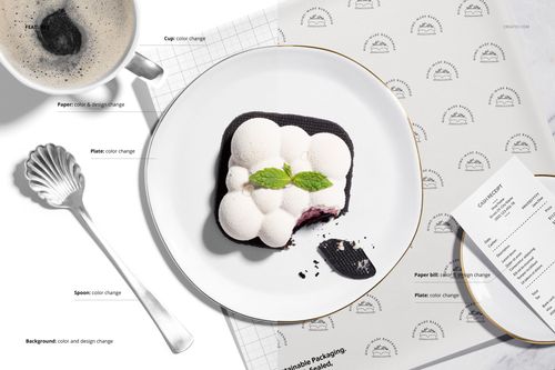 Elegant dessert with white mousse and mint leaves on a round plate, next to a coffee cup and branded mockup paper.