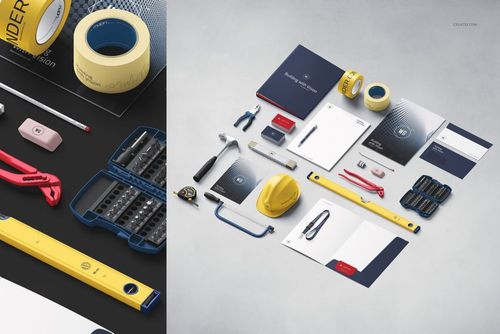 Construction company identity mockup set displaying stationery, tools, and branded items arranged on a flat surface.