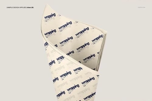 Wrapping tissue paper mockup bundle featuring layered sheets with blue text pattern on a light background.