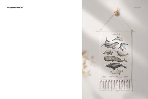 Front view of a mockup showing a fringed wall banner with illustrated sea creatures, displayed in a nursery setting.