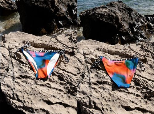 Bikini PSD mockup showing vibrant swimwear bottoms with multicolor design placed on natural rock by the sea.