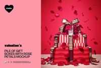 PSD mockup featuring several rectangular gift boxes with striped and solid patterns, topped with bows and rose petals.