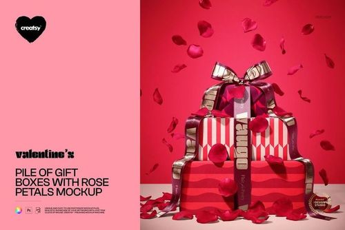 PSD mockup featuring several rectangular gift boxes with striped and solid patterns, topped with bows and rose petals.