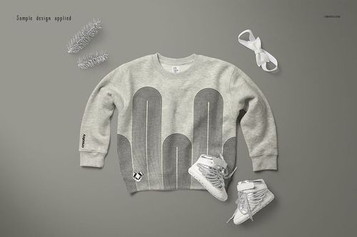 Heather baby sweatshirt mockup displayed flat, featuring a geometric gray pattern, with shoes and ribbon nearby.