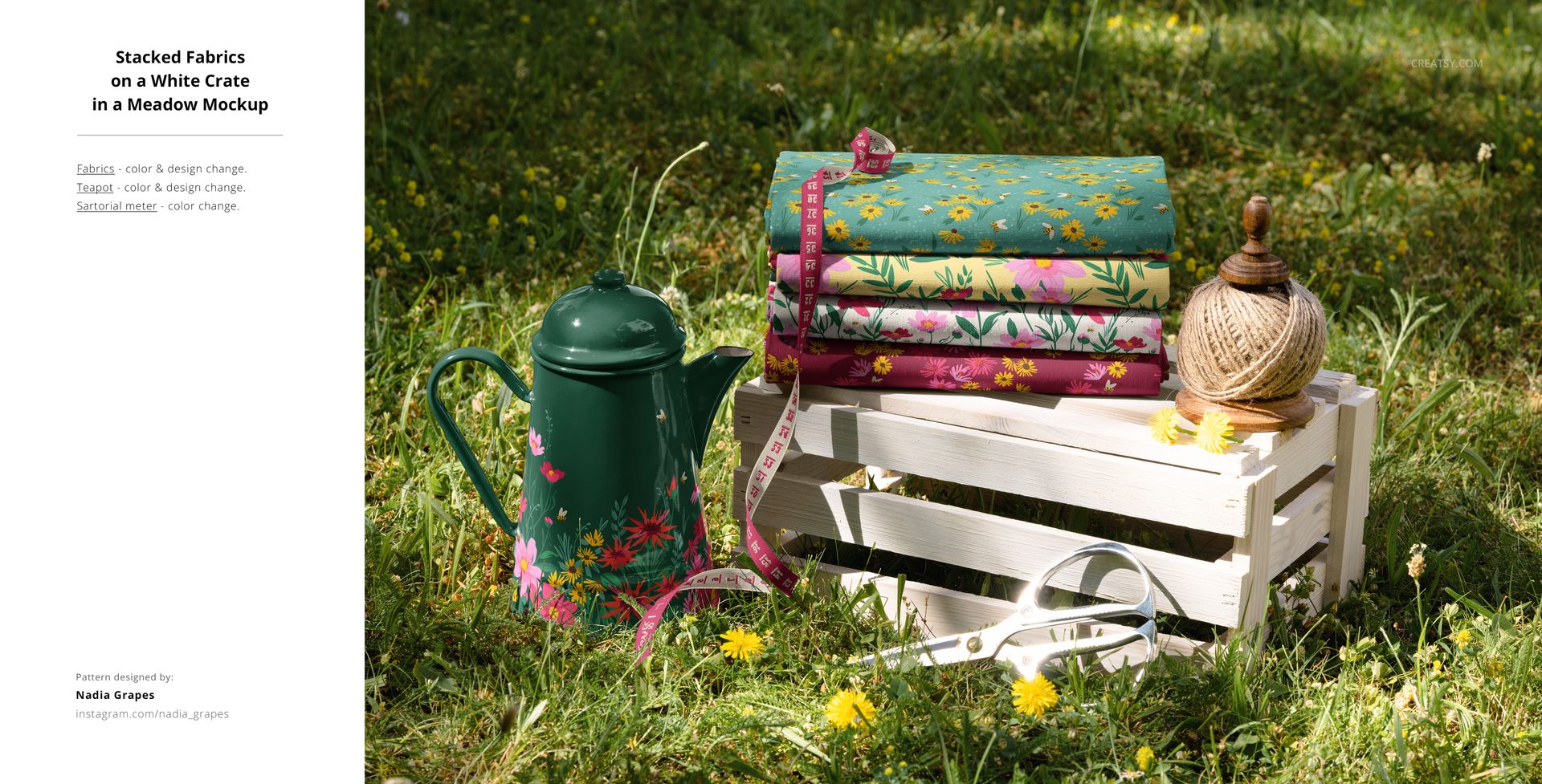 Stack of colorful patterned fabric pieces on a white crate outdoors, surrounded by garden props and green grass.