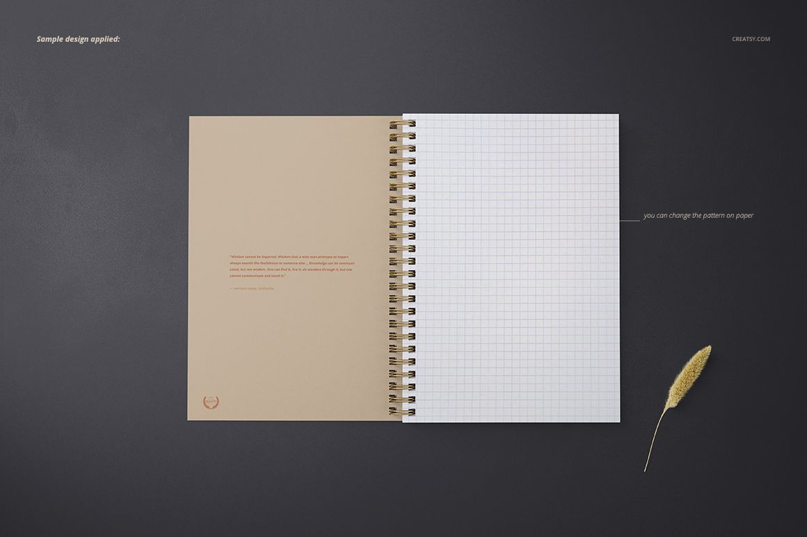 Open A5 spiral notebook mockup with beige left page and white grid right page, placed on a dark background.