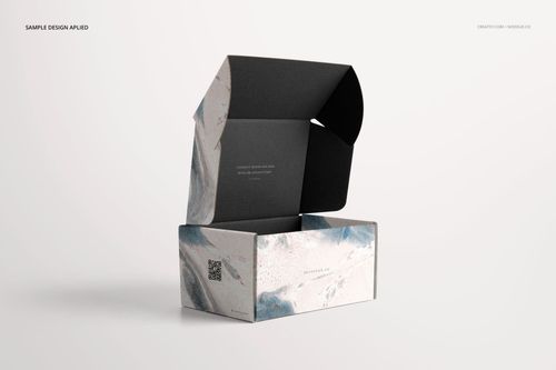 Front angled view of a mockup mailing box featuring a minimalist blue and gray design, lid open on white surface.