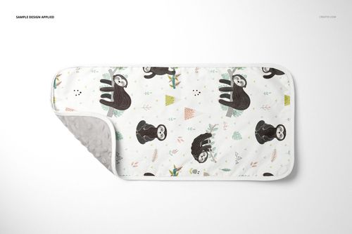 Top view of a minky burp cloth mockup with whimsical sloth illustrations and subtle colored accents on white fabric.