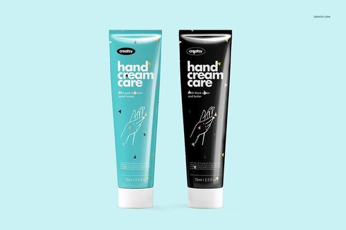 PSD mockup showing a pair of hand cream tubes, one in turquoise and one in black, with clean design and light blue background.