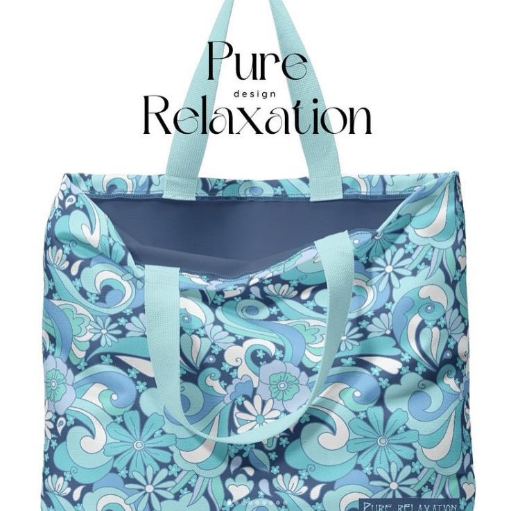 Large poly canvas tote bag mockup with a blue and teal retro floral pattern, shown from the front with handles upright.