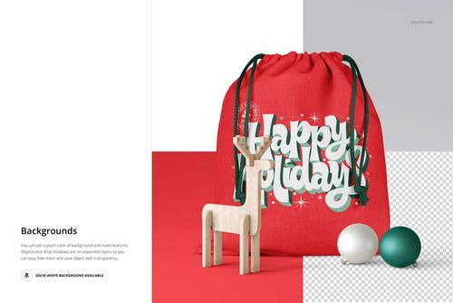 Red Christmas drawstring bag mockup with bold white holiday text, shown beside a wooden reindeer and green baubles.