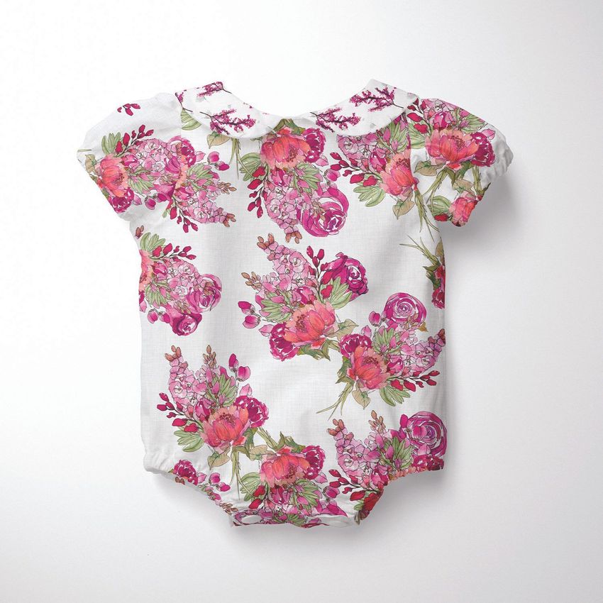 Baby romper mockup featuring a white short-sleeve onesie with a pink and green floral pattern, displayed on a plain light background.