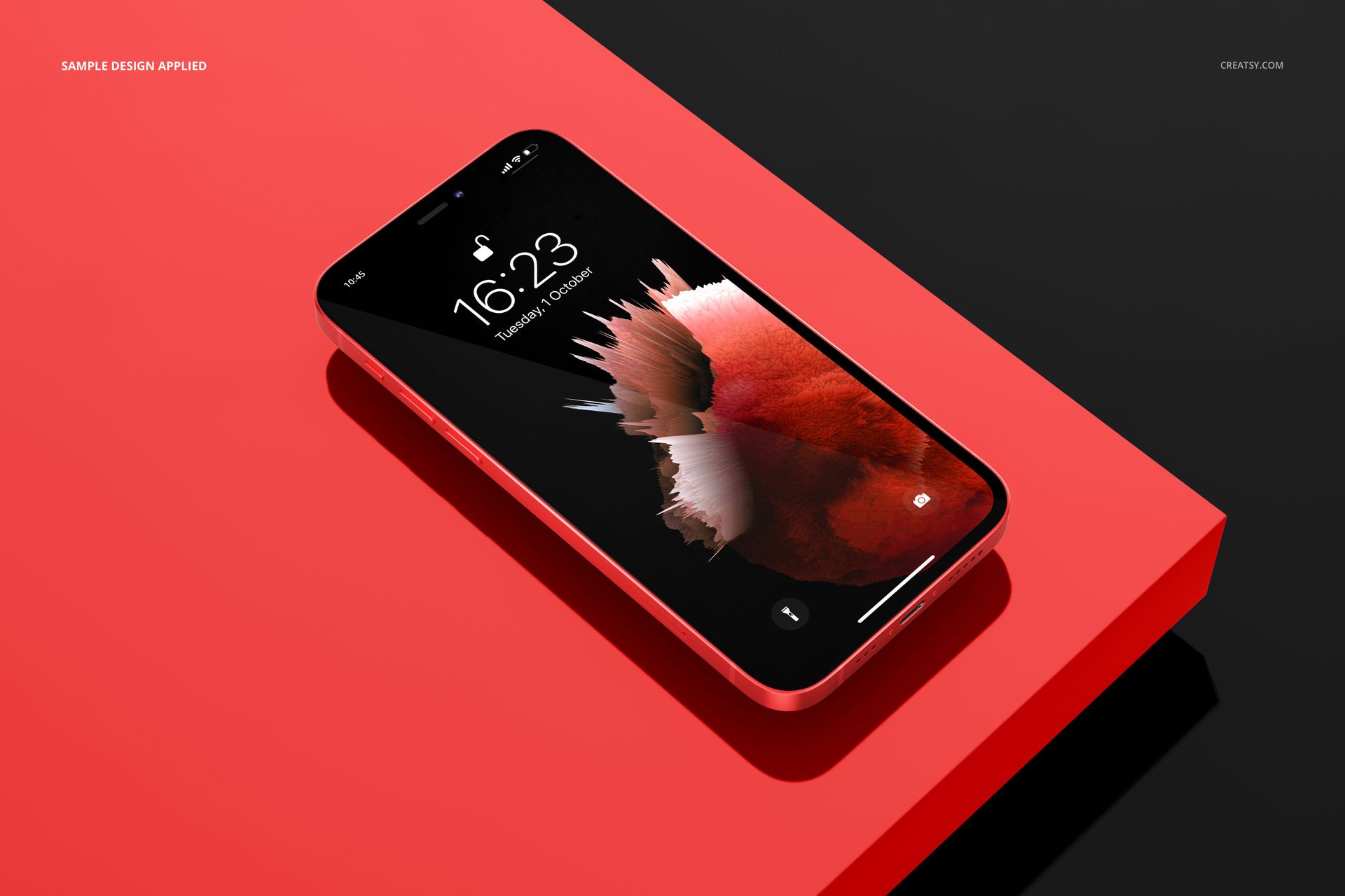 Angled perspective of an iPhone 12 mockup featuring a vivid display, placed on a glossy red rectangular surface.