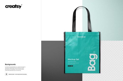 Front view of a laminated non-woven tote bag mockup with black handles, shown against a split mint and gray background.