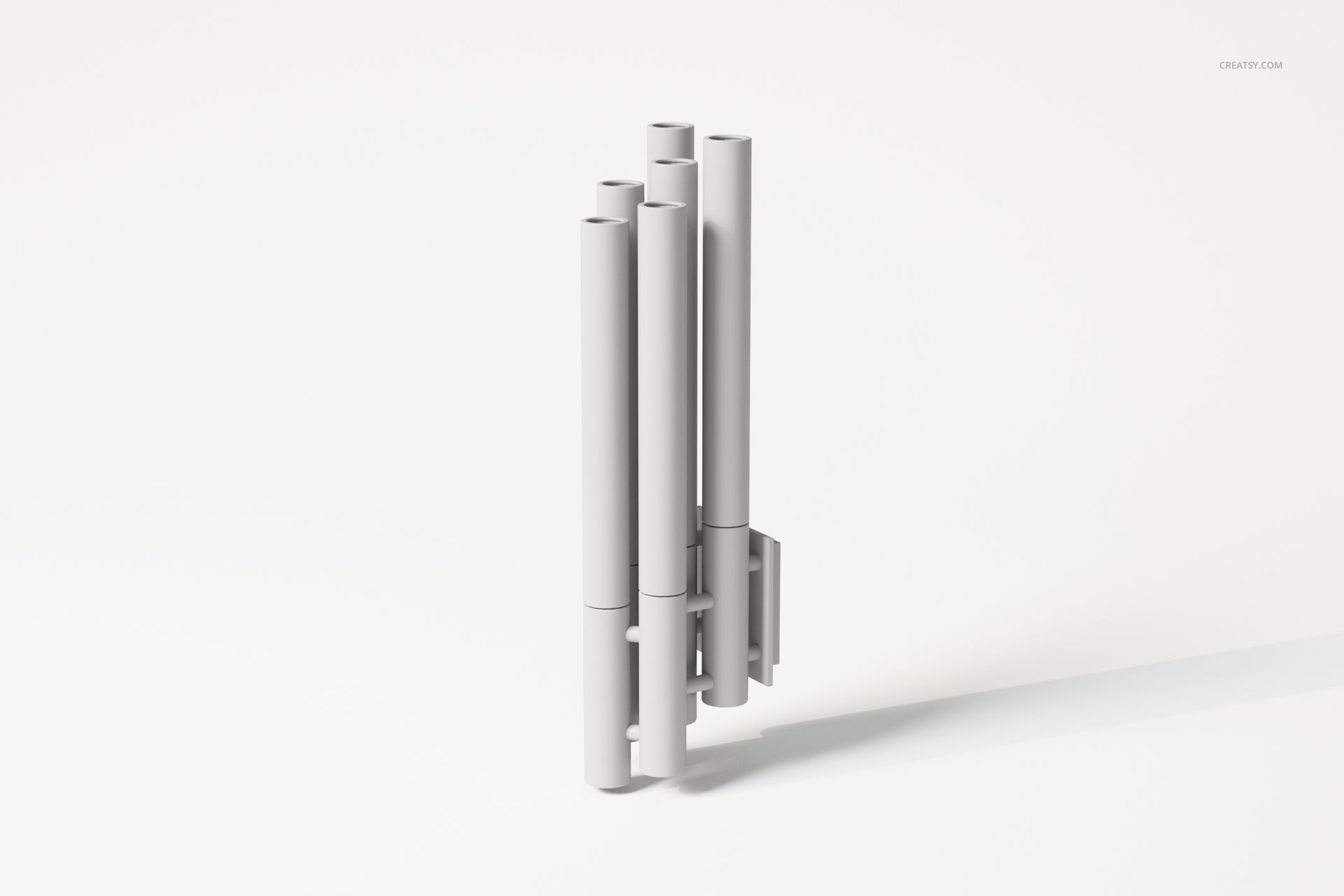 Modern wall light with cylindrical tube shapes in matte white, shown in a front view against a plain background.