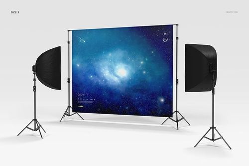 Custom printed backdrop mockup showing a cosmic blue pattern, set up with two softbox lights in a studio scene.