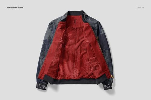 Men's bomber jacket mockup displayed open, featuring dark floral patterned sleeves and a vibrant red interior lining.