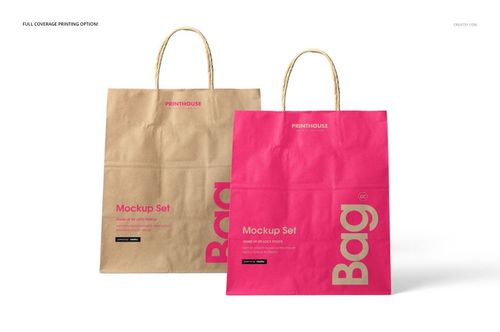 PSD mockup of shopping bags in kraft brown and vivid pink, both upright with handles, set against a plain white backdrop.