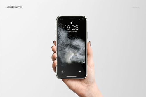 Close-up of a person’s hand displaying an iPhone 11 Pro mockup with a monochrome cloud pattern on the screen.