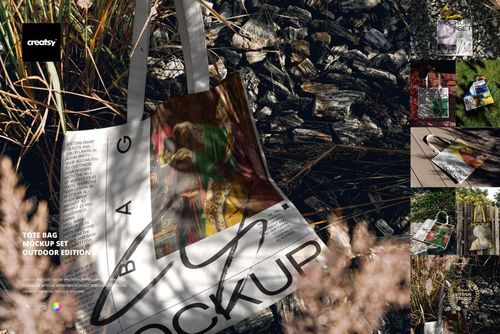 Tote bag with printed design displayed outdoors on rocky ground with dry grass, shown in a realistic mockup scene.