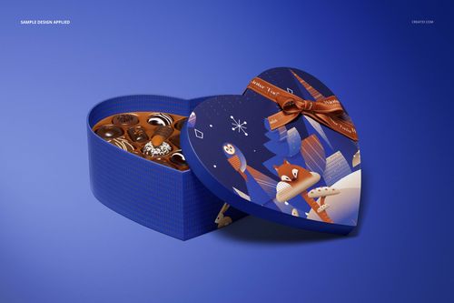 Open heart-shaped box mockup featuring custom blue lid design, brown ribbon, and visible chocolates from a side angle.