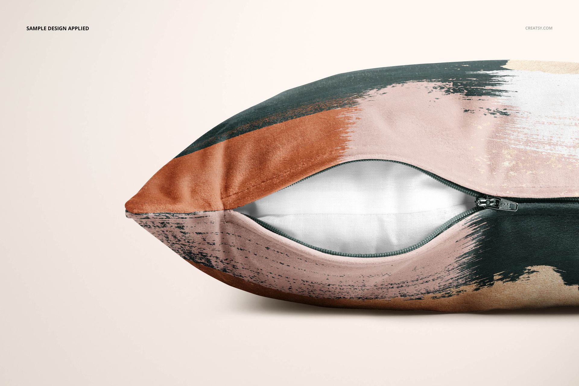 Velvet pillow cover mockup featuring a zippered opening and painted design in black, pink, and brown hues.