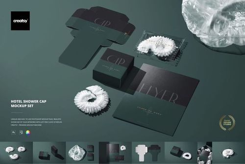 Hotel shower cap mockup set featuring a round white shower cap, dark green packaging, and unfolded box on a green surface.