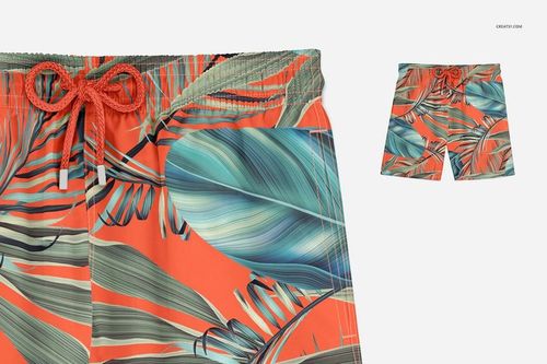 PSD mockup of adult swim trunks with a bold tropical pattern, displayed with a detailed and a full garment view.