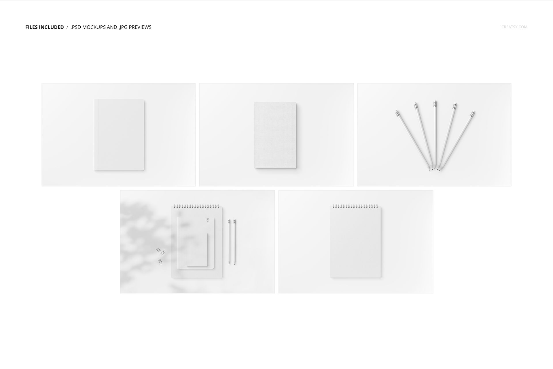 Stationery set mockup showing blank notepads and pencils arranged on a white surface, viewed from above.