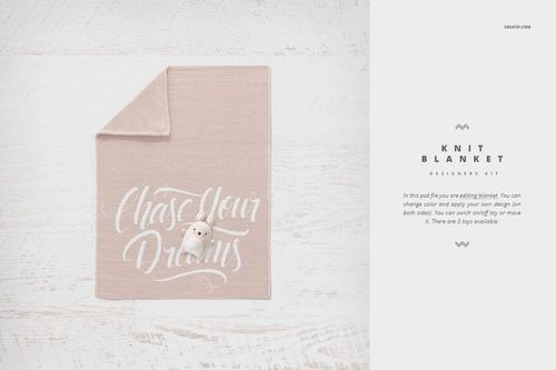 Light pink knit baby blanket mockup with white script text, folded corner, and plush toy on white wood surface.