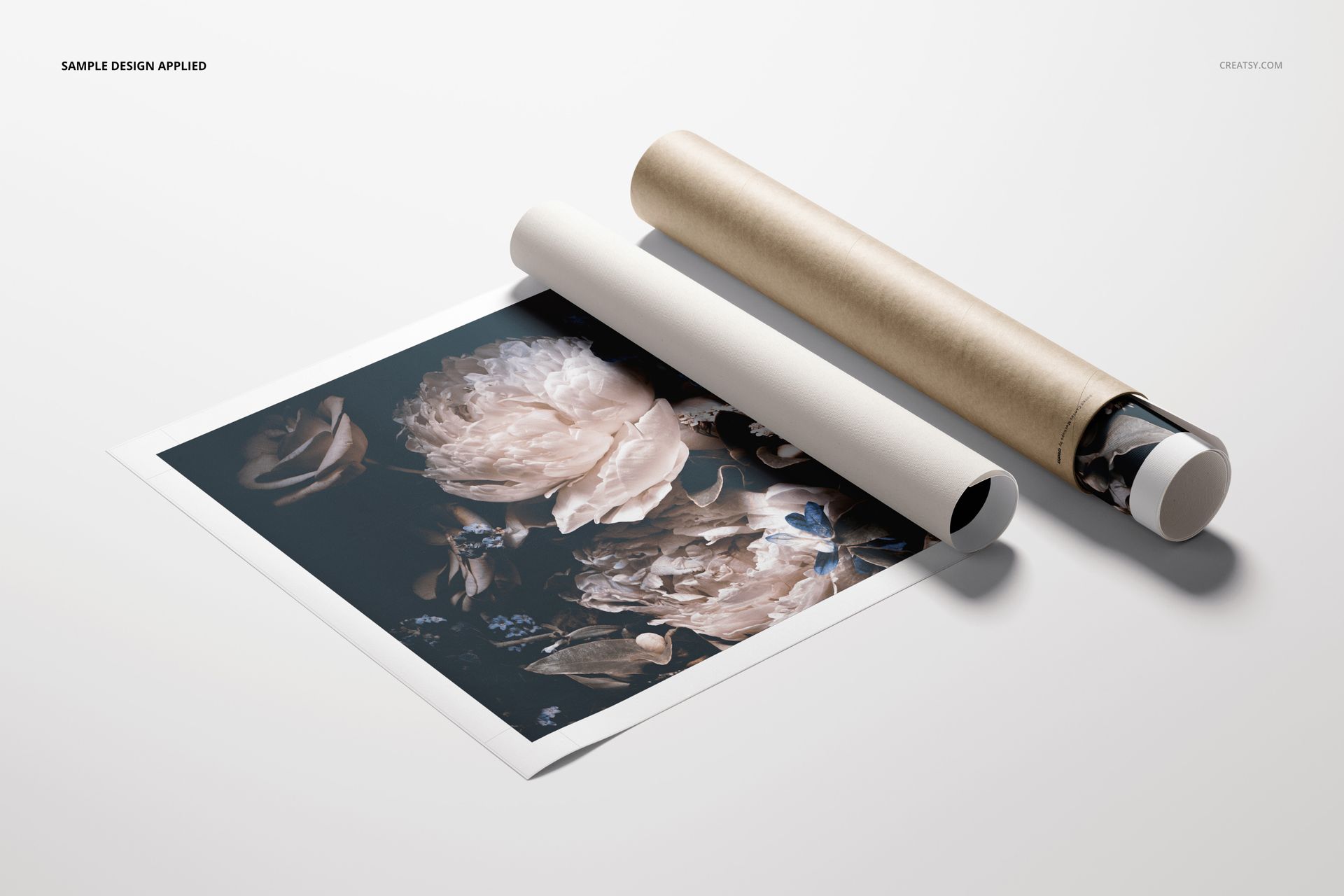 PSD mockup of a rectangular canvas print with flowers, partially unrolled next to an open packaging tube.