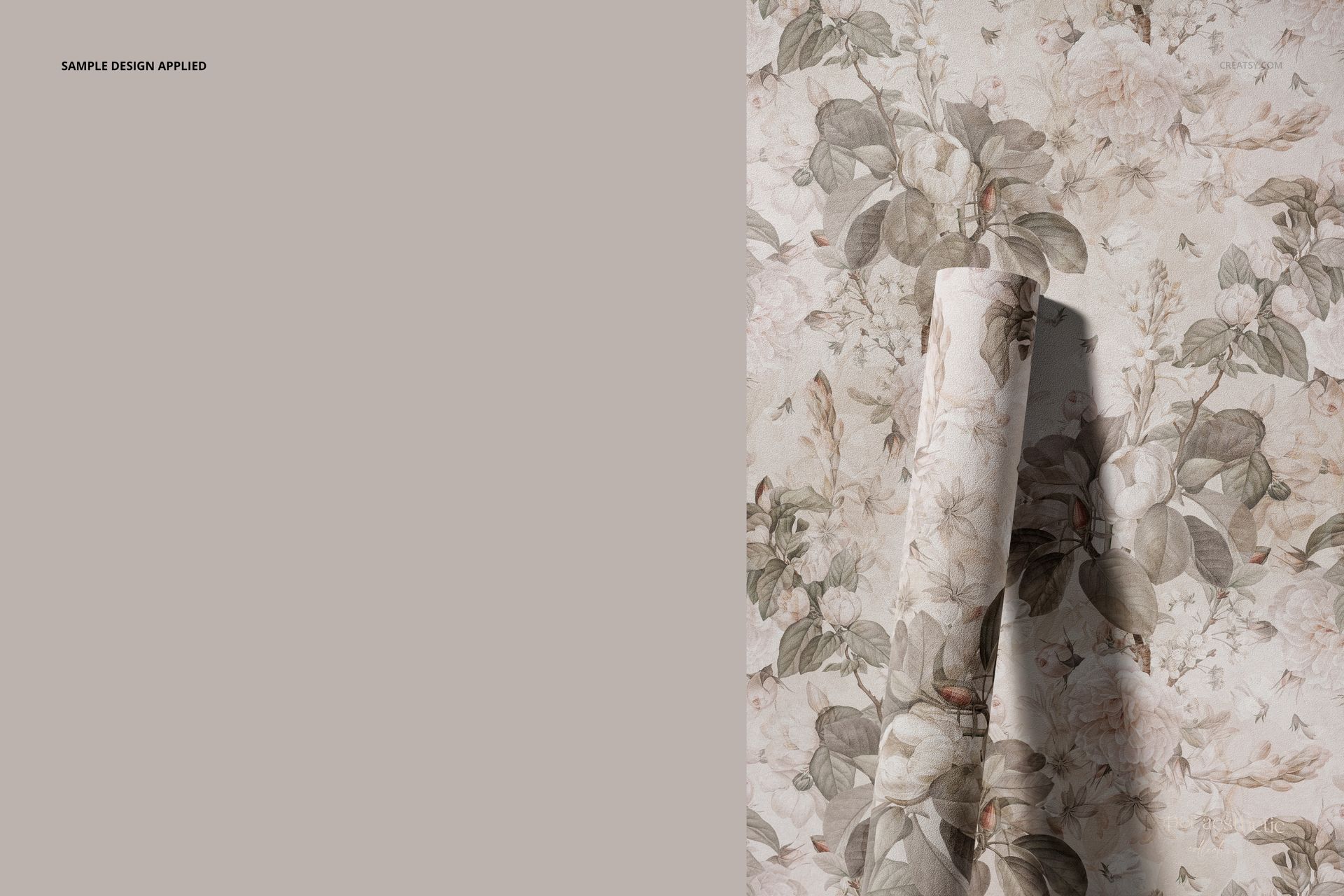 PSD mockup showing non-woven vinyl wallpaper roll featuring soft botanical prints, positioned against a patterned wall.