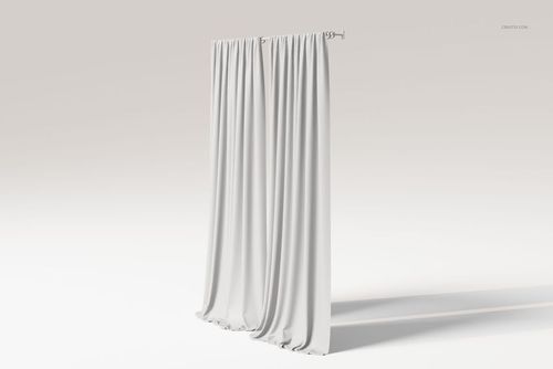 Front view of two flowing white curtains hanging from a rod, fabric pooling gently on a plain light background.