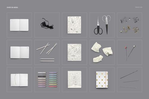 Assorted sewing and crafting tools, notebooks, colored pencils, and fabric pieces arranged on a gray background.