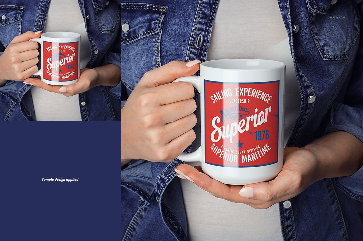 Front view of a white ceramic mug with a red and blue nautical design, held in both hands by a person wearing a denim jacket.