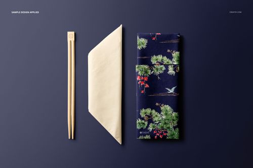 PSD mockup set showing chopsticks, a simple napkin, and a colorful patterned napkin arranged on a navy background.