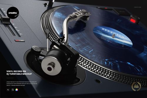 PSD mockup featuring a realistic DJ turntable setup with a blue patterned vinyl record and stylus in position.