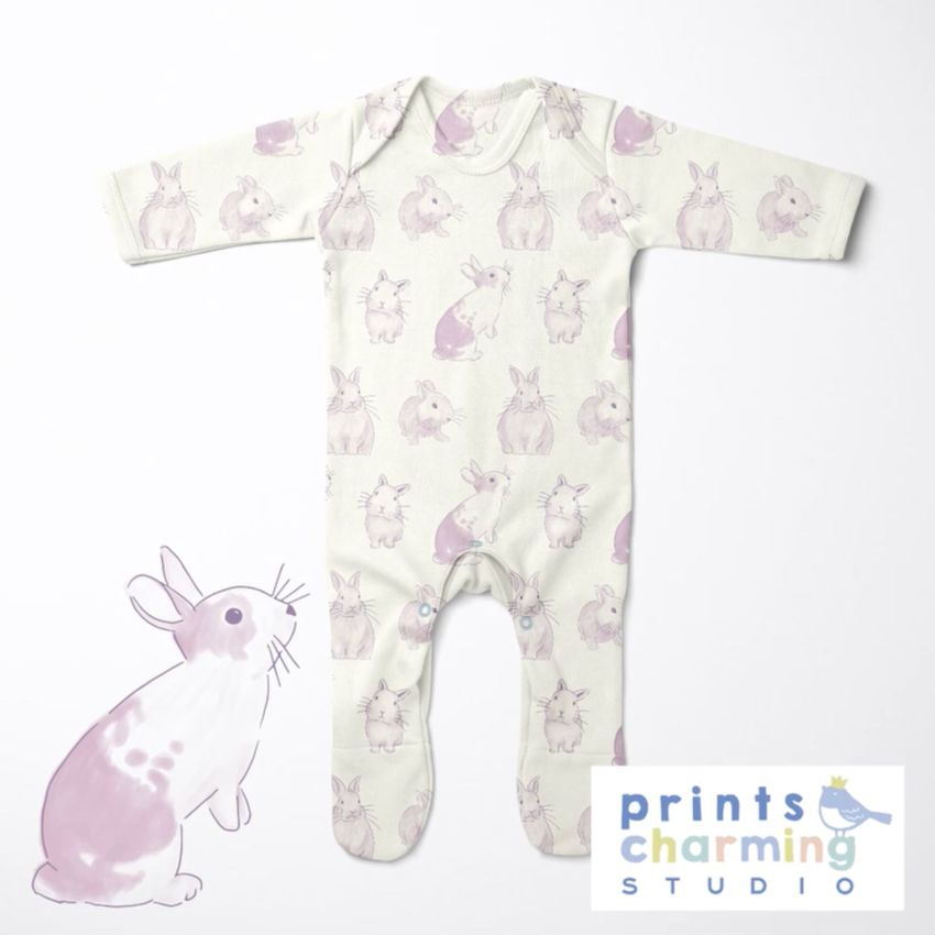 Baby chest rompersuit mockup featuring a long-sleeve onesie with a pastel bunny pattern, shown on a white background.