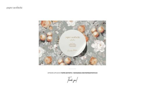 Front view of a chocolate bar packaging mockup with a floral and peach pattern on a gray background.