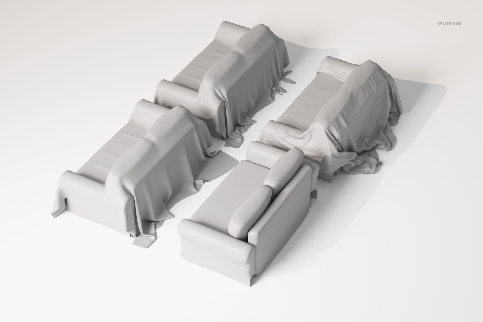 Four sofas covered with plain light gray throw covers, arranged on a white surface, viewed from an elevated angle.