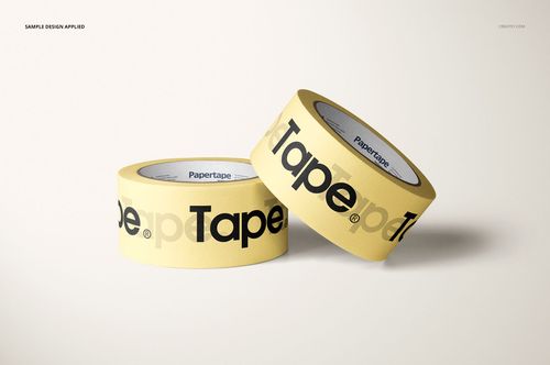 Two rolls of yellow masking tape with bold black text, displayed on a light surface in a realistic mockup scene.