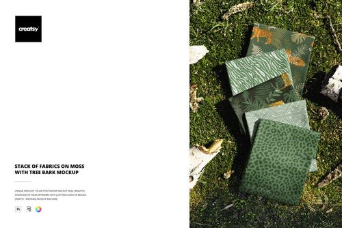 PSD mockup showing assorted fabrics with nature-inspired designs laid out on mossy ground and surrounded by bark.