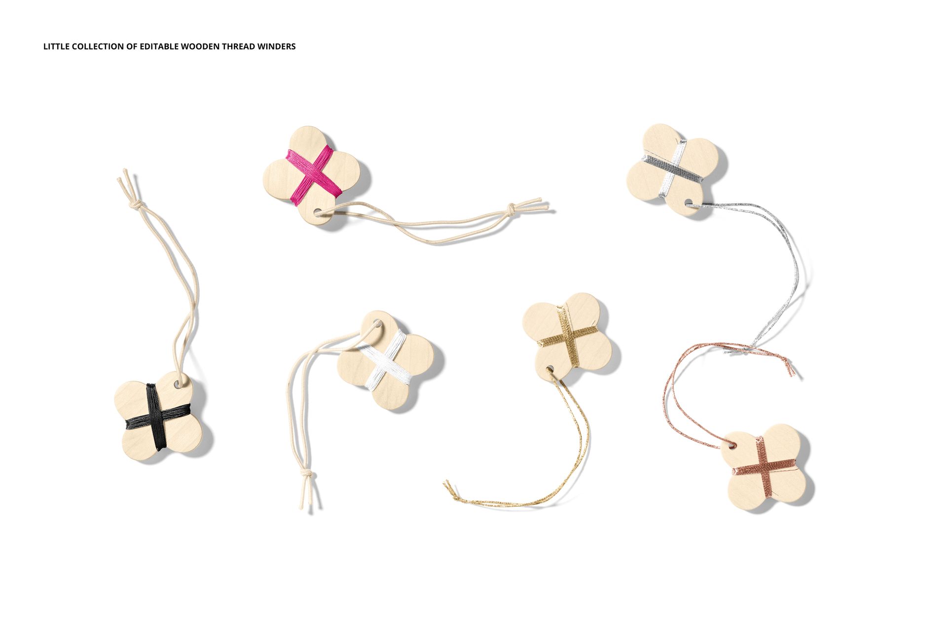 Fabric swatches mockup set featuring six wooden winders with colored threads and strings, shown from above on white.