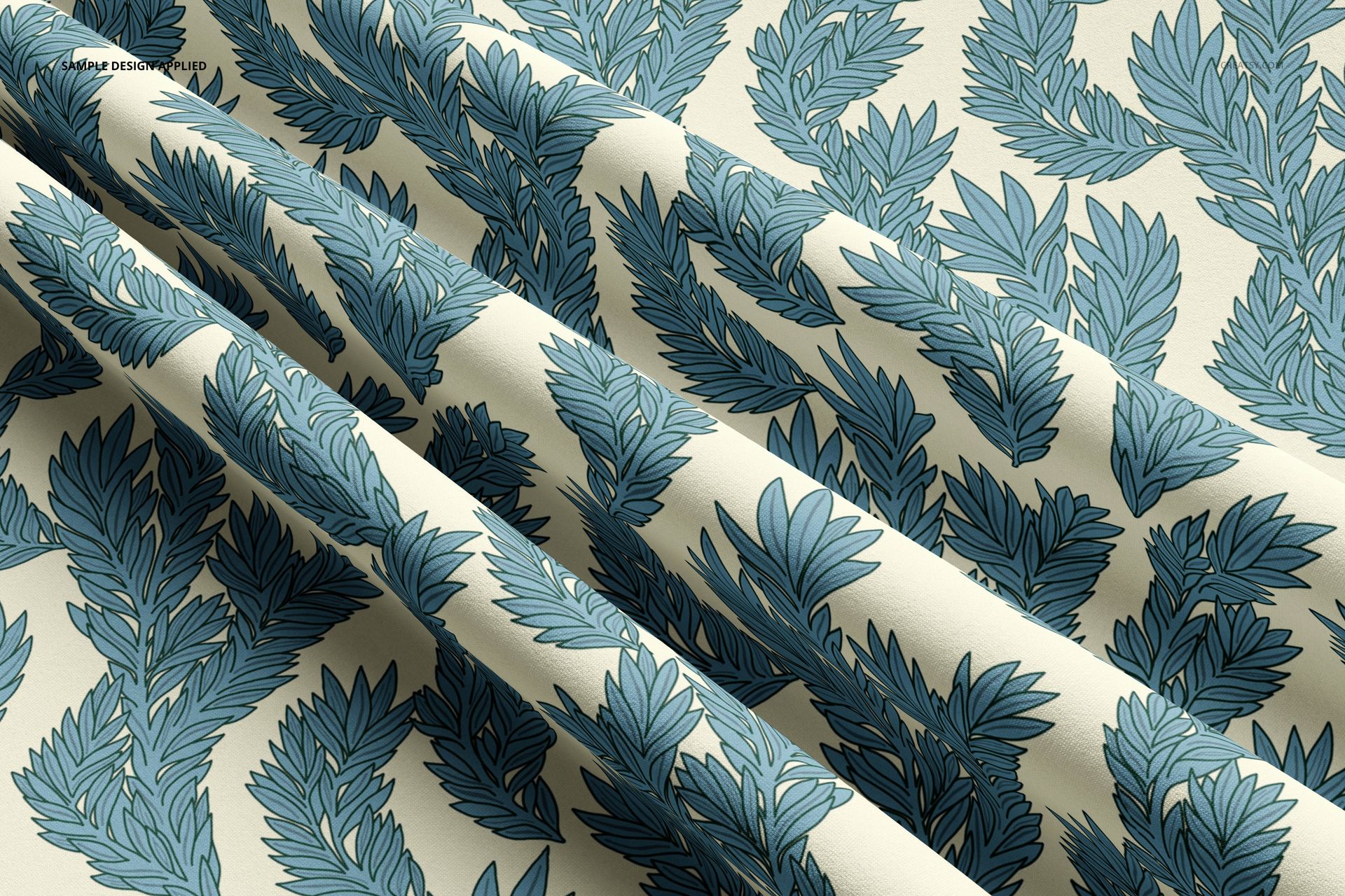 Double brushed polyester fabric mockup featuring a blue leaf pattern on a cream background, shown in a close-up view.