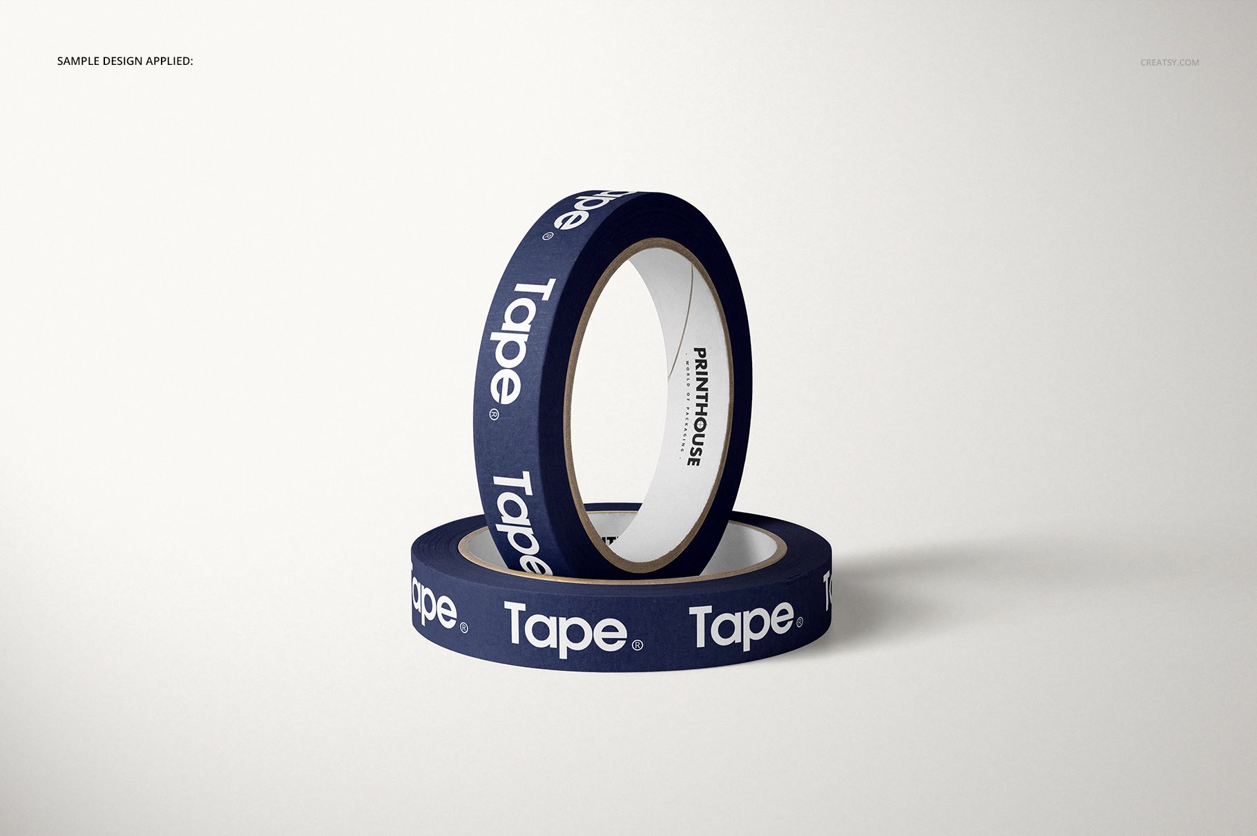 Close-up of packing tape mockup featuring two rolls, dark blue with white lettering, set against a light background.