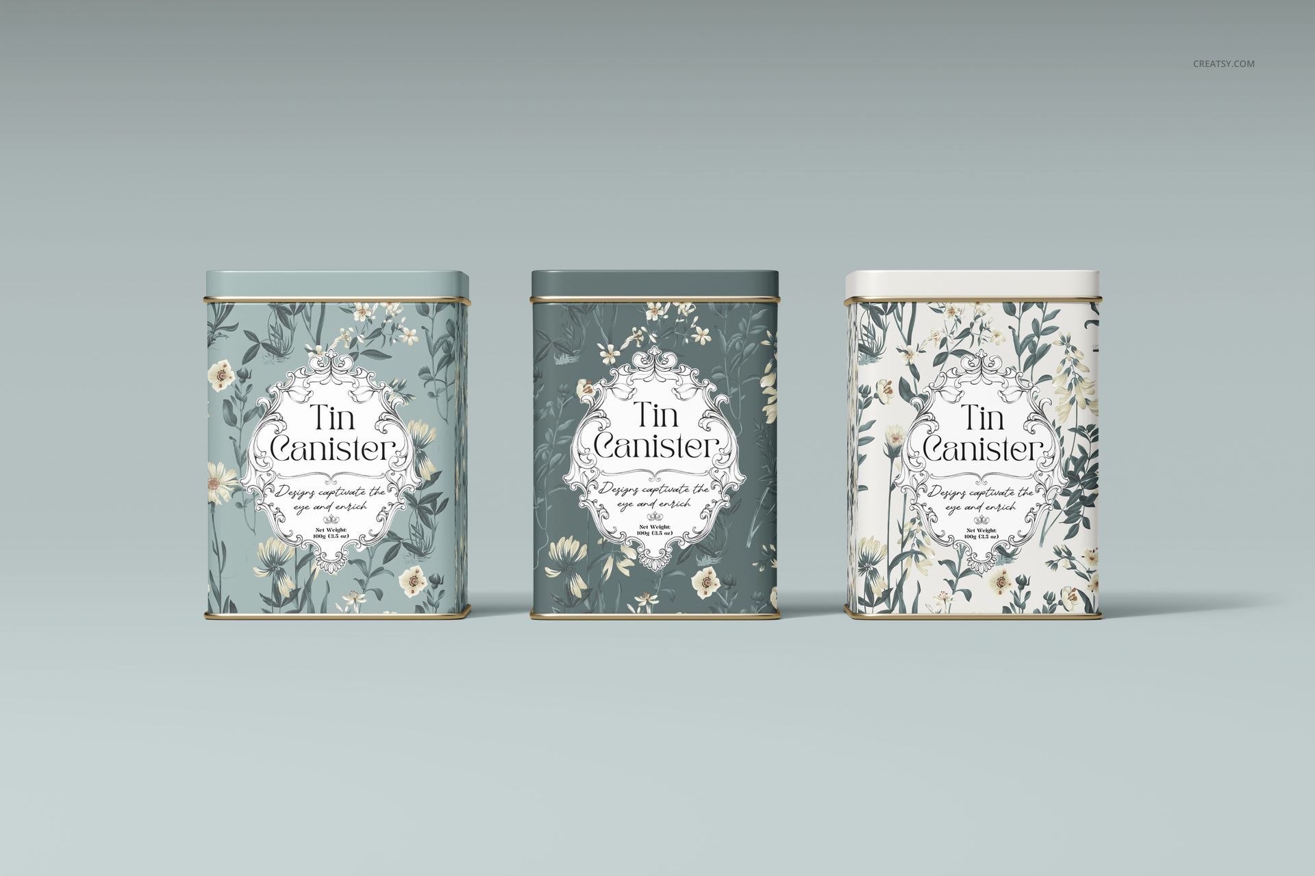 Tin canister PSD mockup set displaying three floral-patterned containers in pastel colors on a neutral surface.