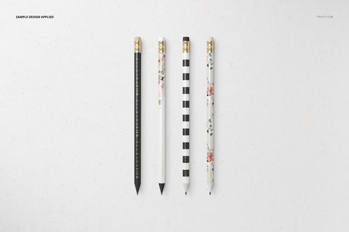Stationery set mockup featuring four pencils with unique decorative prints, shown from a top view on a white background.