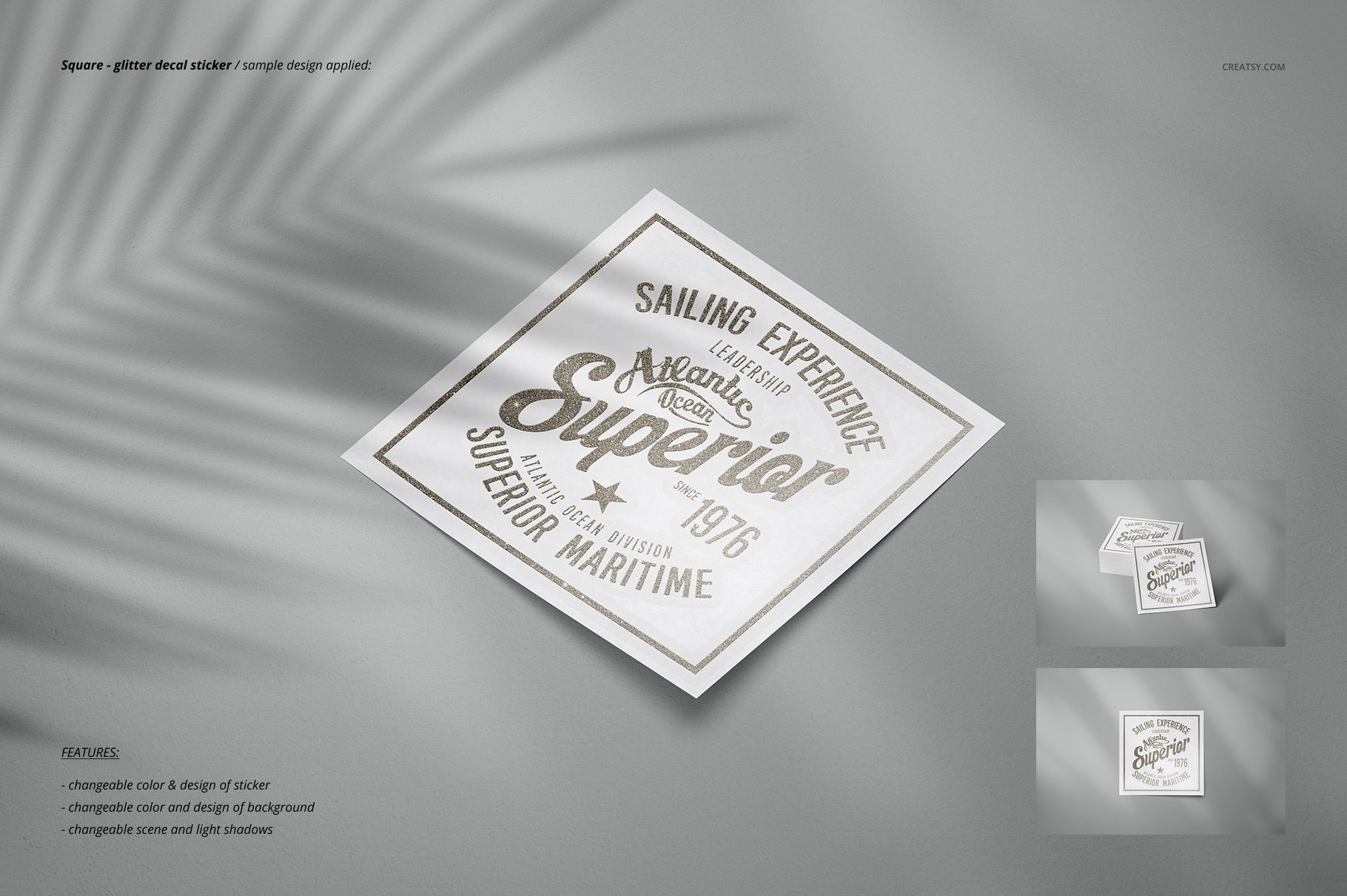 Square decal sticker mockup with metallic text design on a light background, shown from a top view with soft shadows.