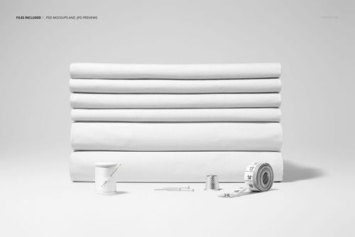 Folded fabrics mockup featuring plain white textiles stacked in a row, accompanied by sewing accessories on a neutral background.