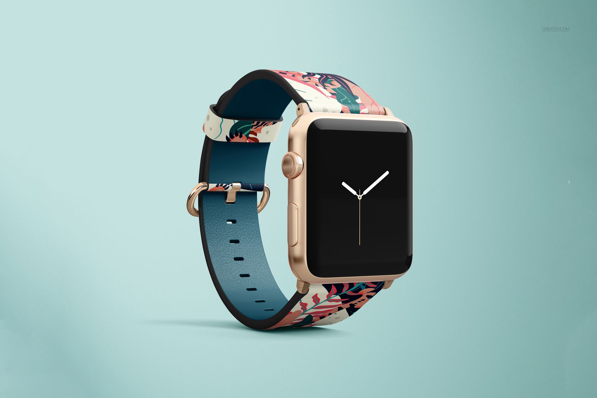 PSD mockup of an Apple Watch with a patterned leather band, gold case, and teal interior, displayed against a plain backdrop.